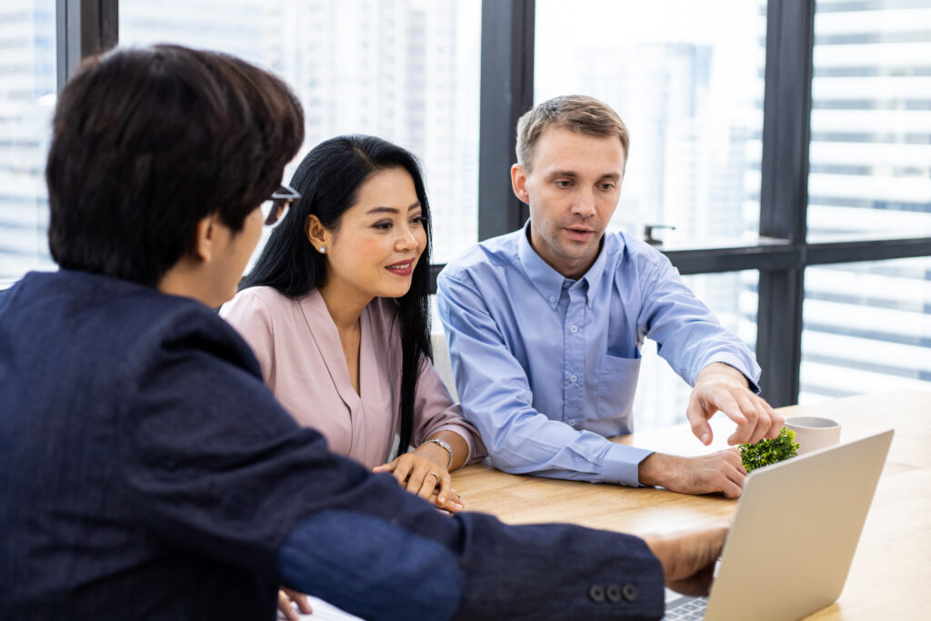 Business development consultant talking to clients